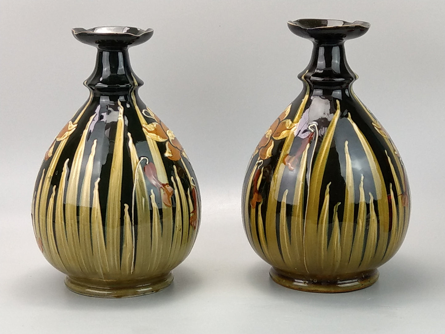 Pair of Art Nouveau pottery vases with Daffodils