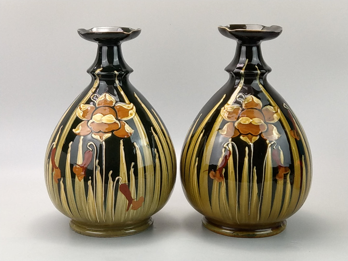 Pair of Art Nouveau pottery vases with Daffodils