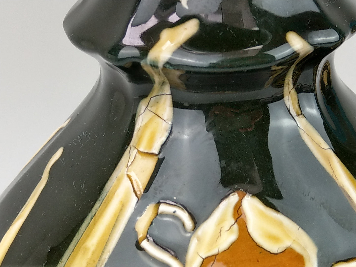 Pair of Art Nouveau pottery vases with Daffodils