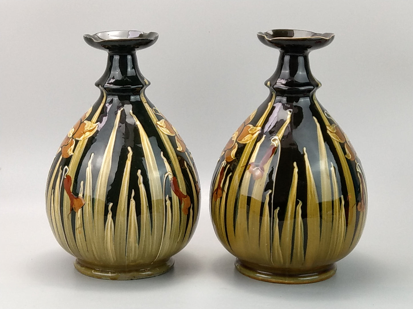 Pair of Art Nouveau pottery vases with Daffodils