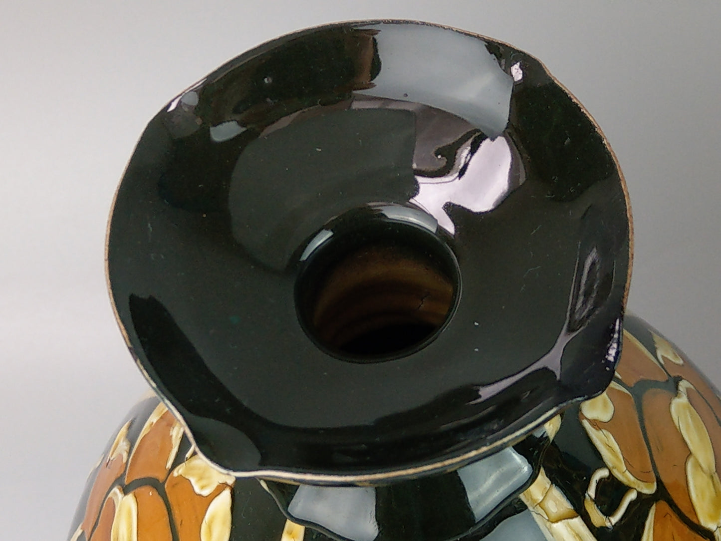 Pair of Art Nouveau pottery vases with Daffodils