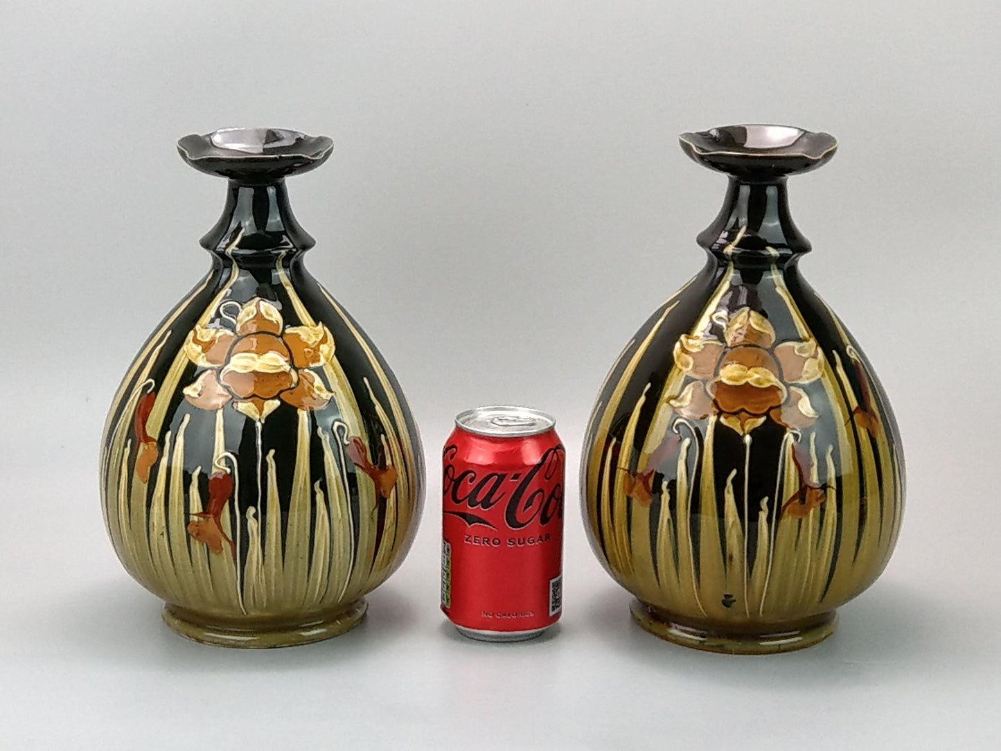 Pair of Art Nouveau pottery vases with Daffodils