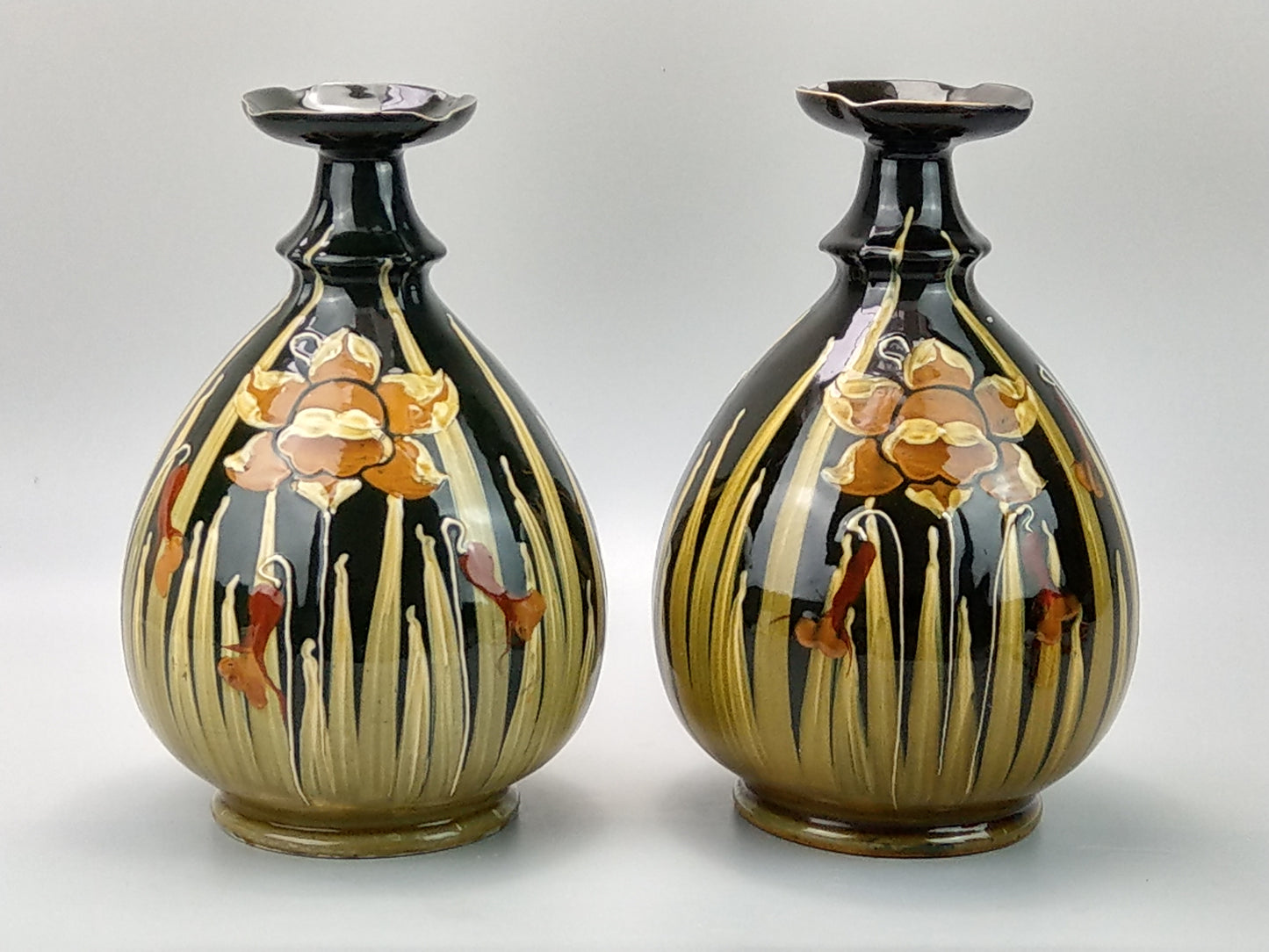 Pair of Art Nouveau pottery vases with Daffodils
