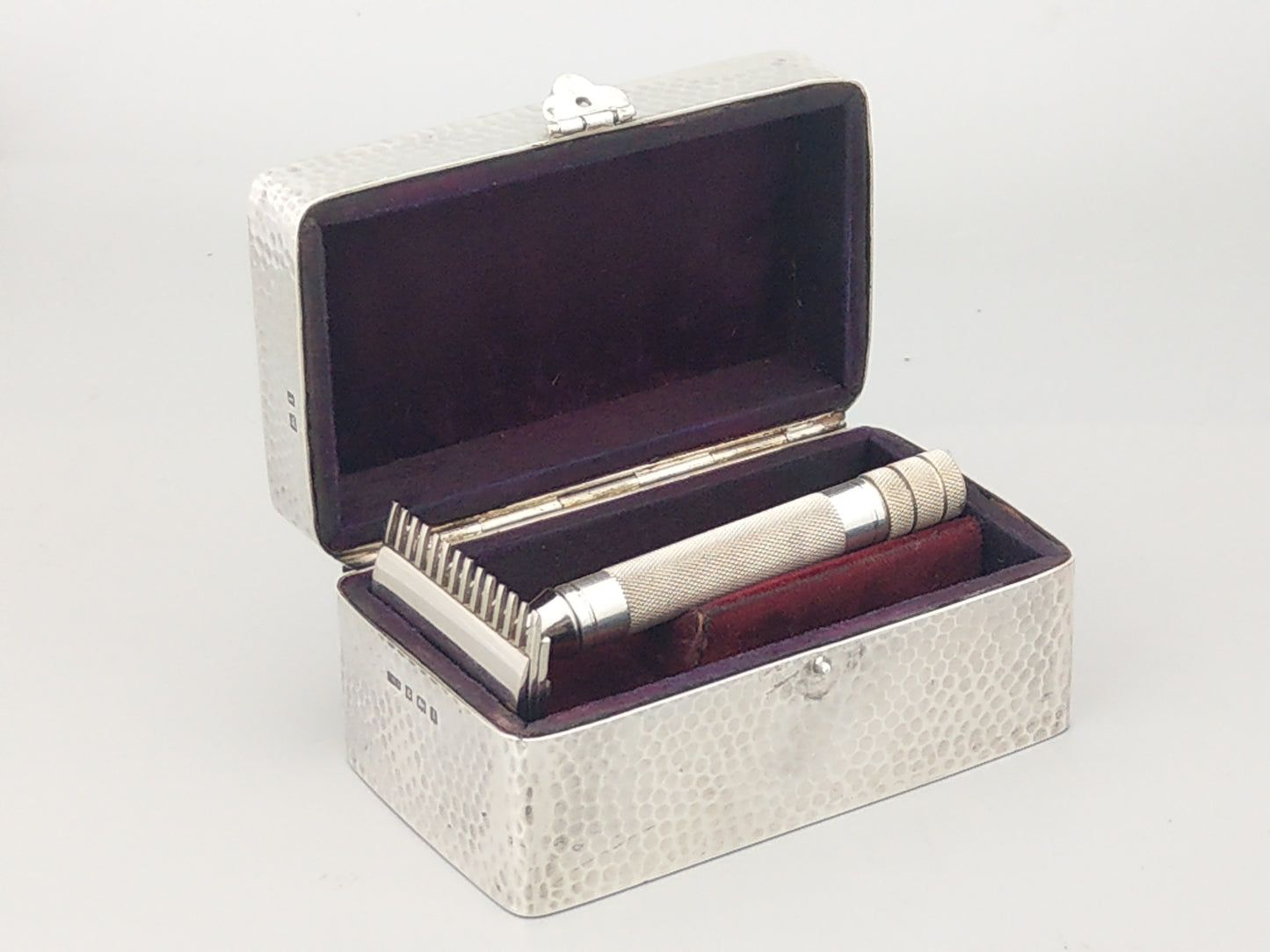 Sterling silver hammered box for razor by Levi and Salaman, 1910, with initials H.G.T.
