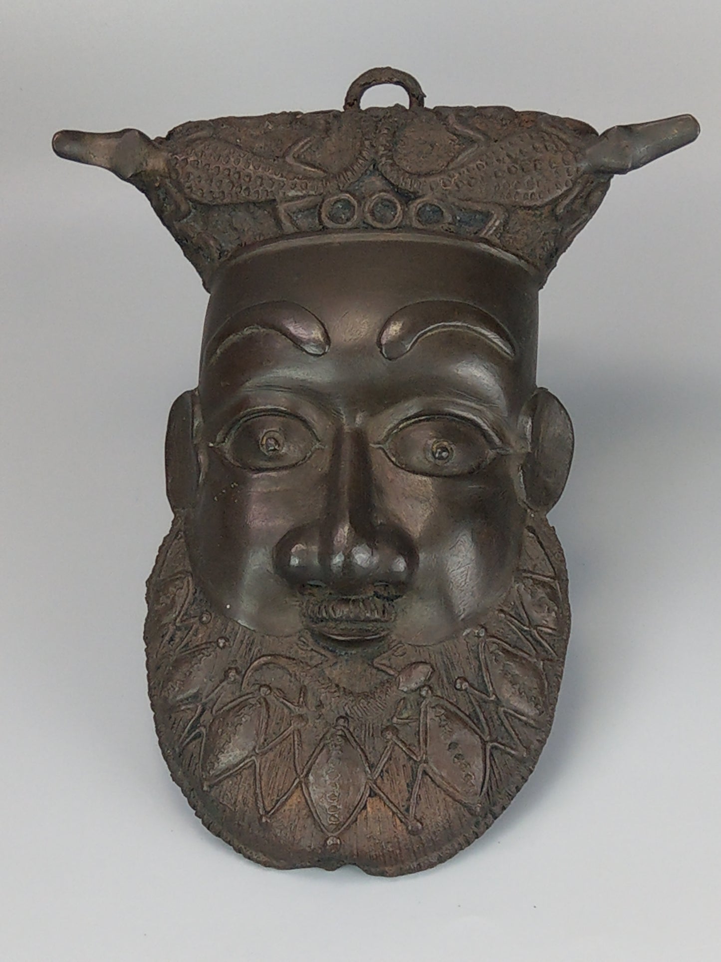 Tribal Bronze mask crowned chief