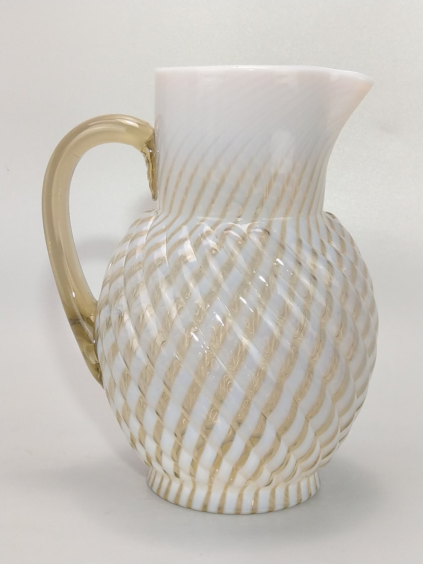 Vaseline Opalescent Glass Pitcher Reverse Swirl Buckeye No. 528