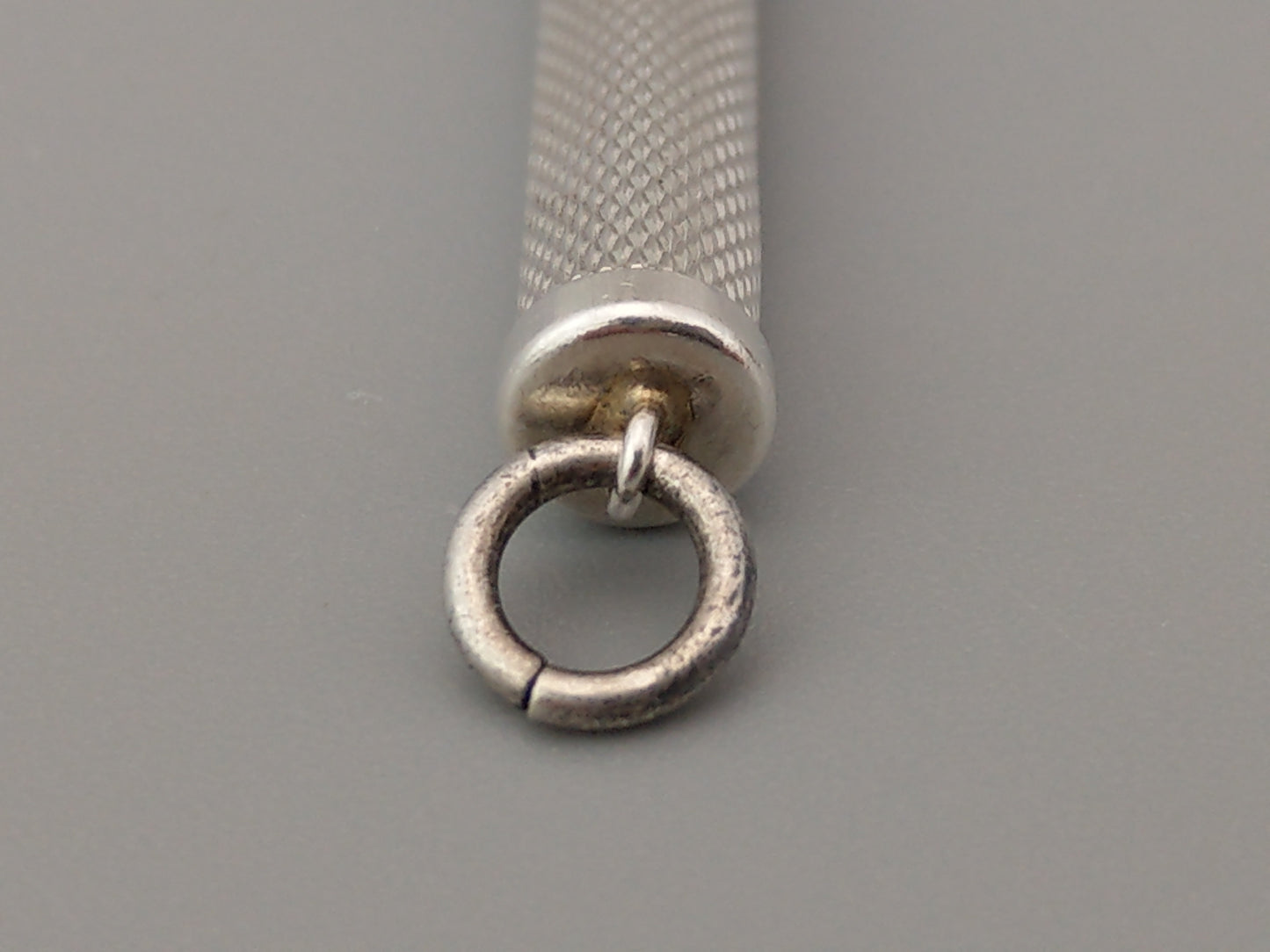 Sterling silver Toothpick pendant with gold tip by William Manton