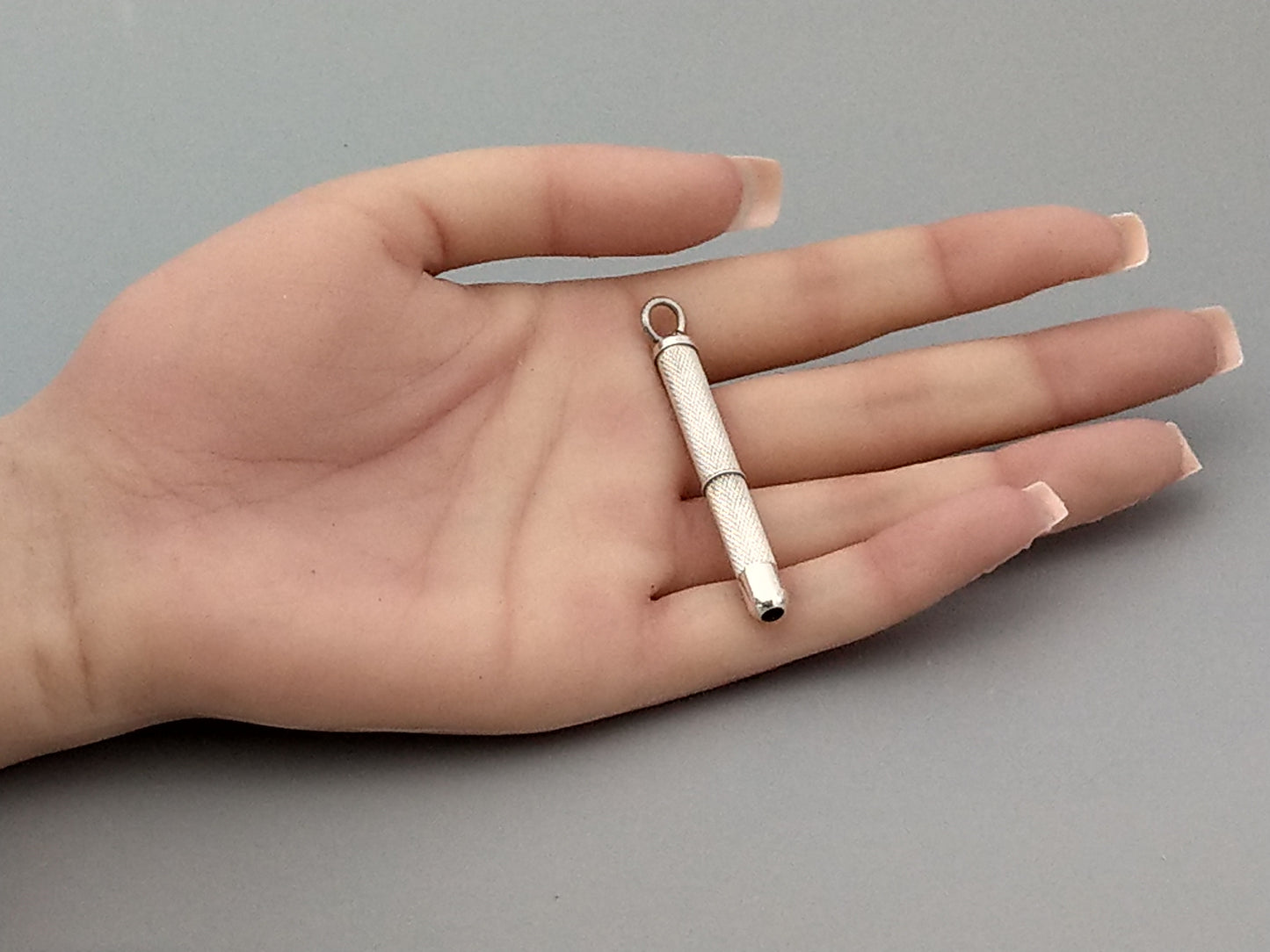 Sterling silver Toothpick pendant with gold tip by William Manton