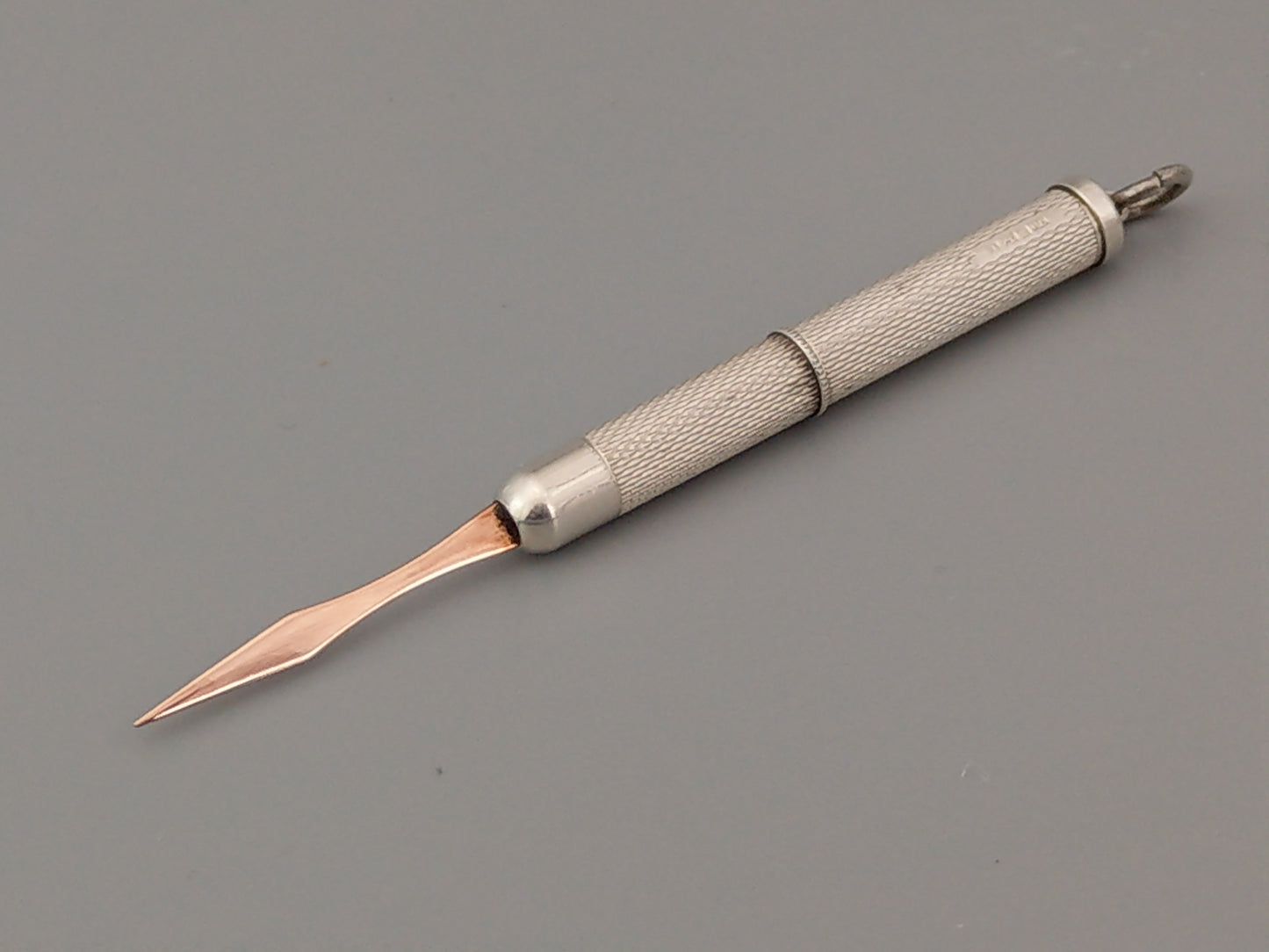 Sterling silver Toothpick pendant with gold tip by William Manton