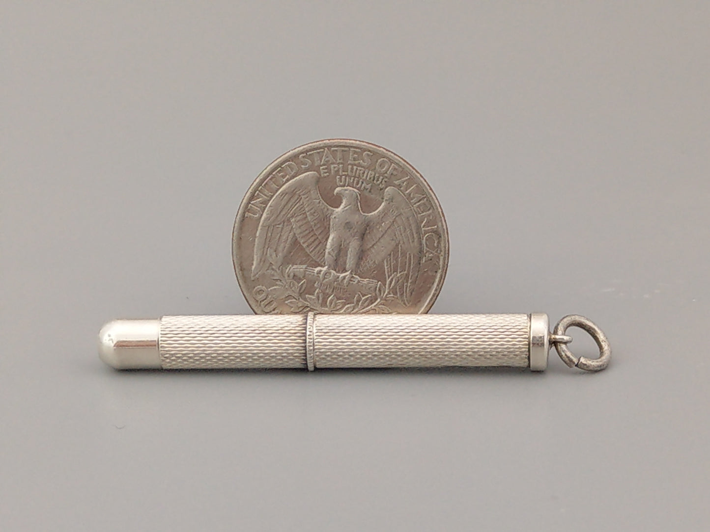 Sterling silver Toothpick pendant with gold tip by William Manton