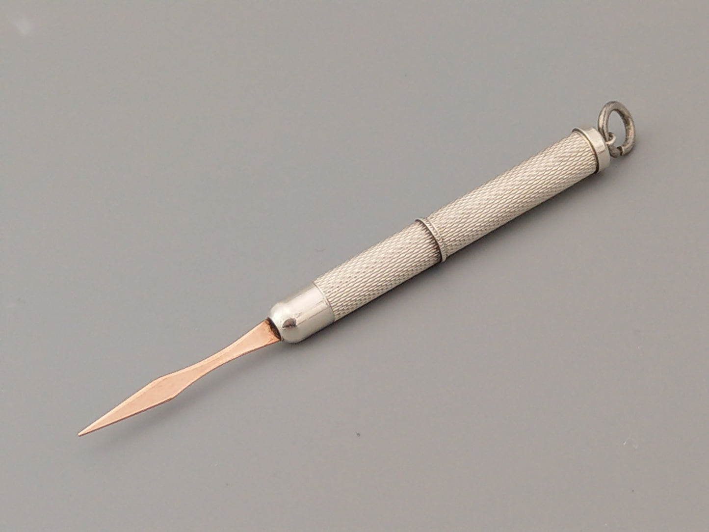 Sterling silver Toothpick pendant with gold tip by William Manton