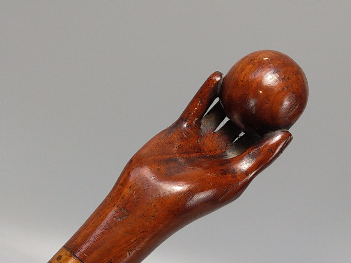 Antique Walking Stick with Carved Lady's Hand and Ball