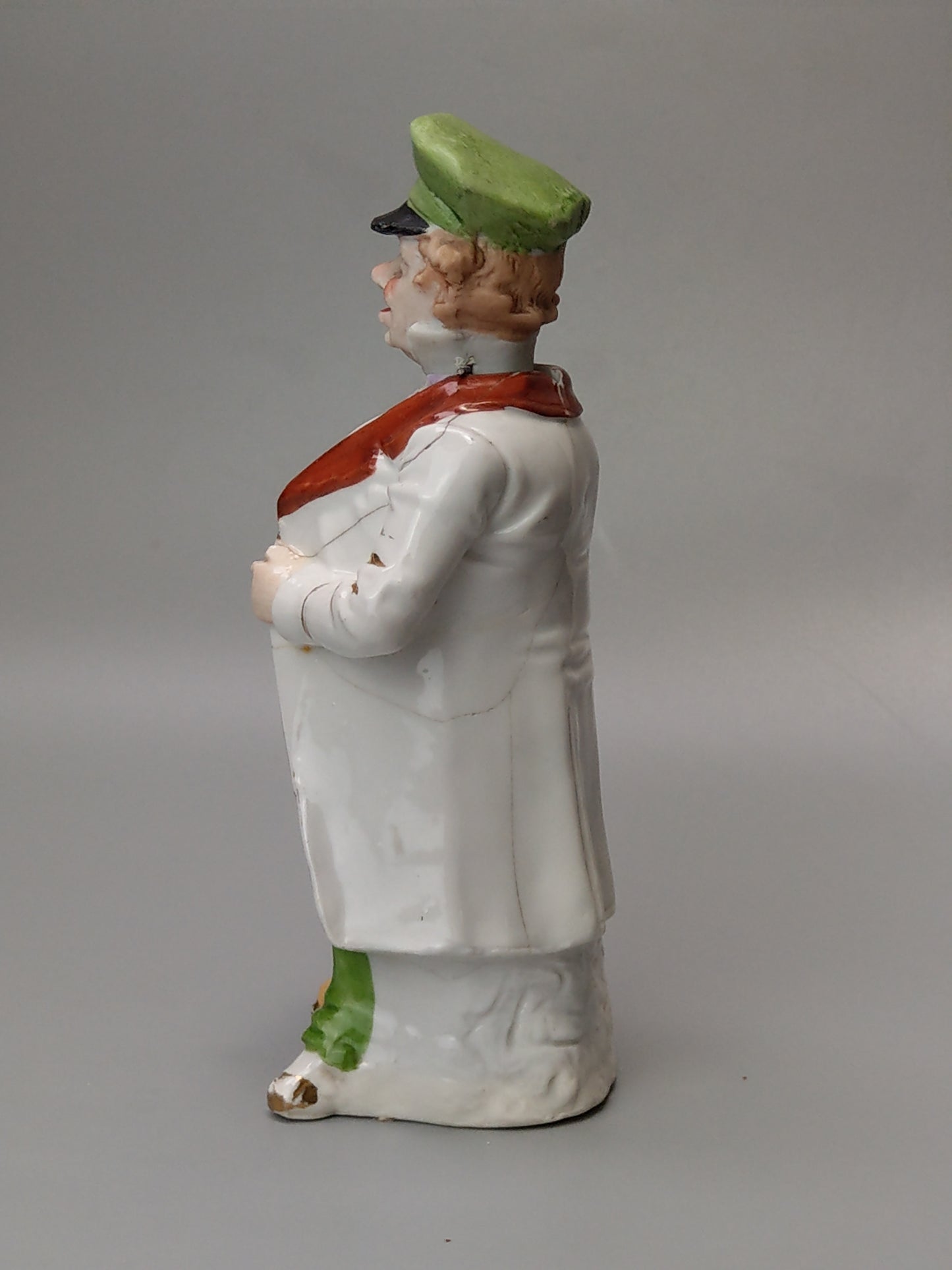Nodding head figurine: Gentleman with umbrella, German bisque porcelain
