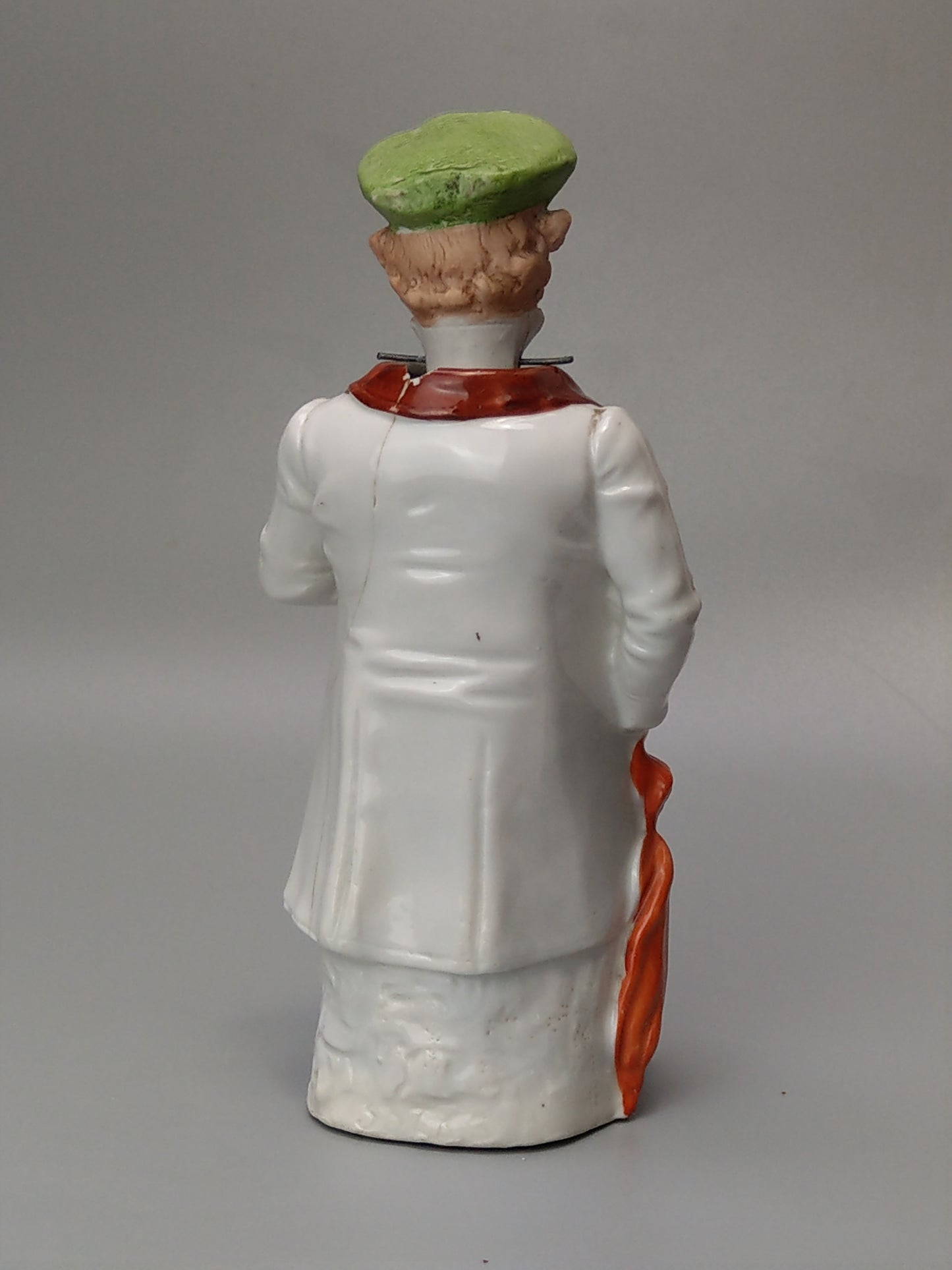 Nodding head figurine: Gentleman with umbrella, German bisque porcelain