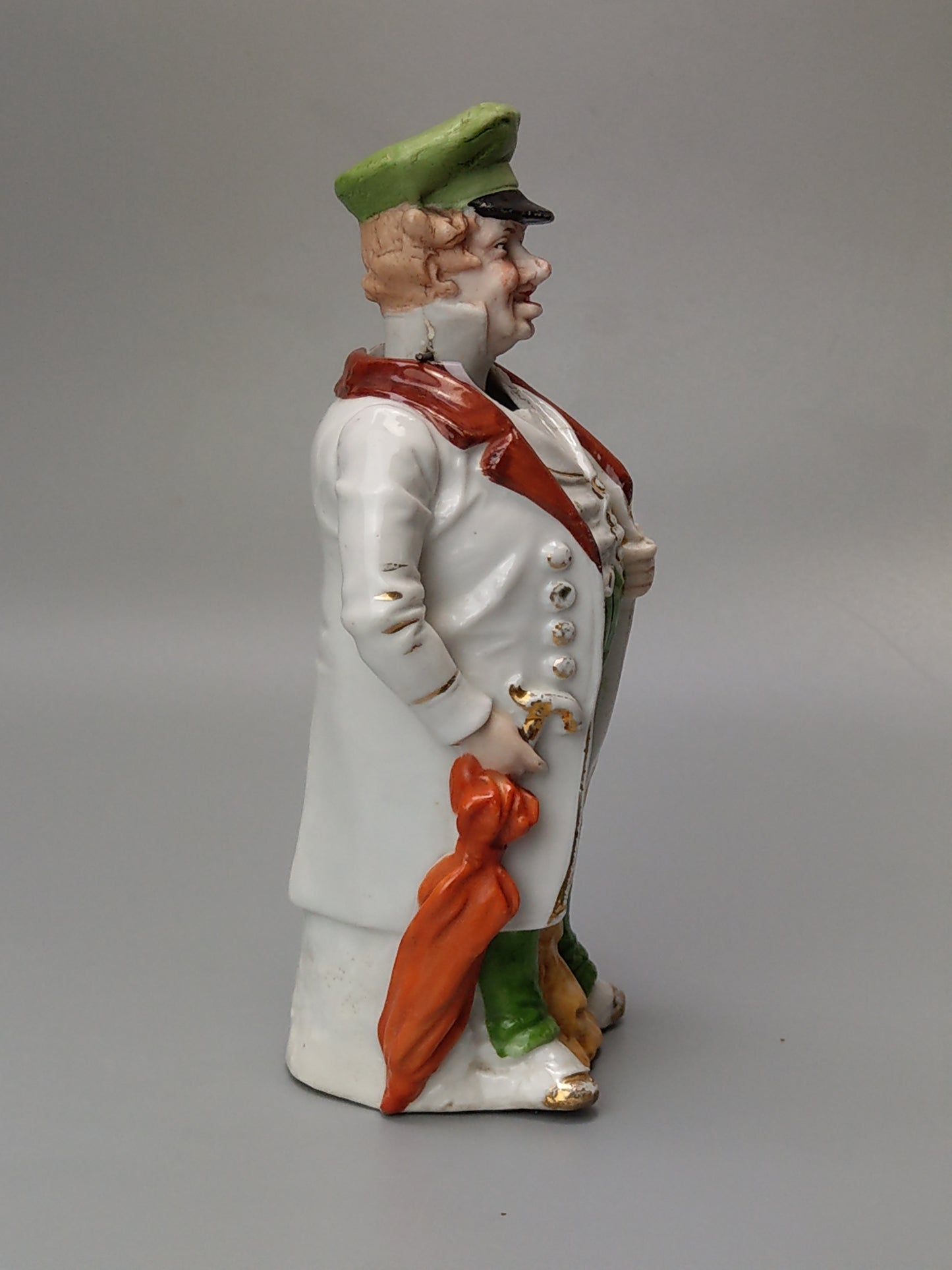 Nodding head figurine: Gentleman with umbrella, German bisque porcelain
