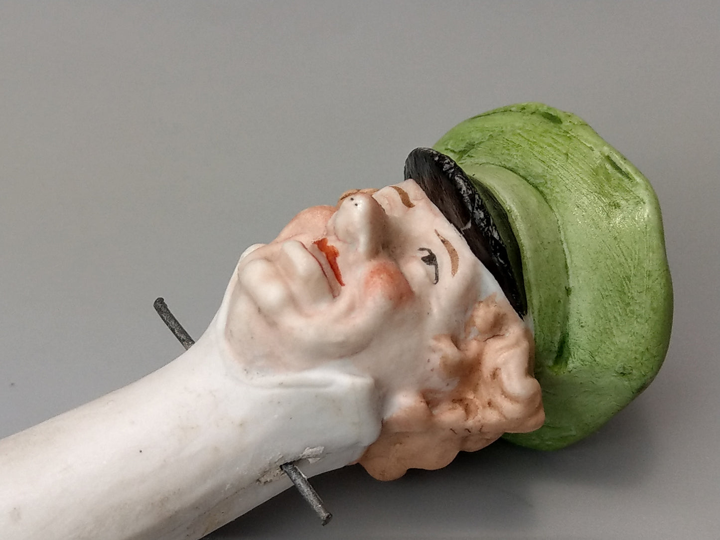 Nodding head figurine: Gentleman with umbrella, German bisque porcelain