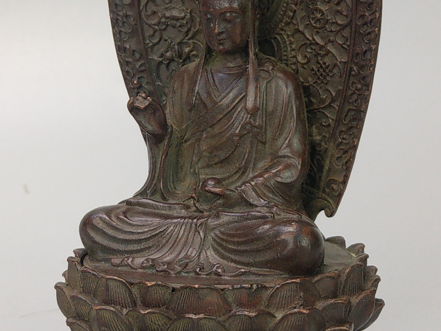 Antique Small Crowned Buddha on Lotus Leaf