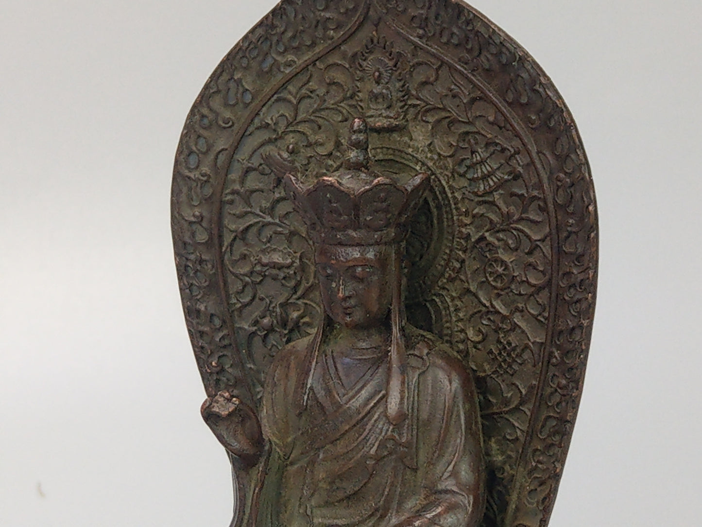 Antique Small Crowned Buddha on Lotus Leaf
