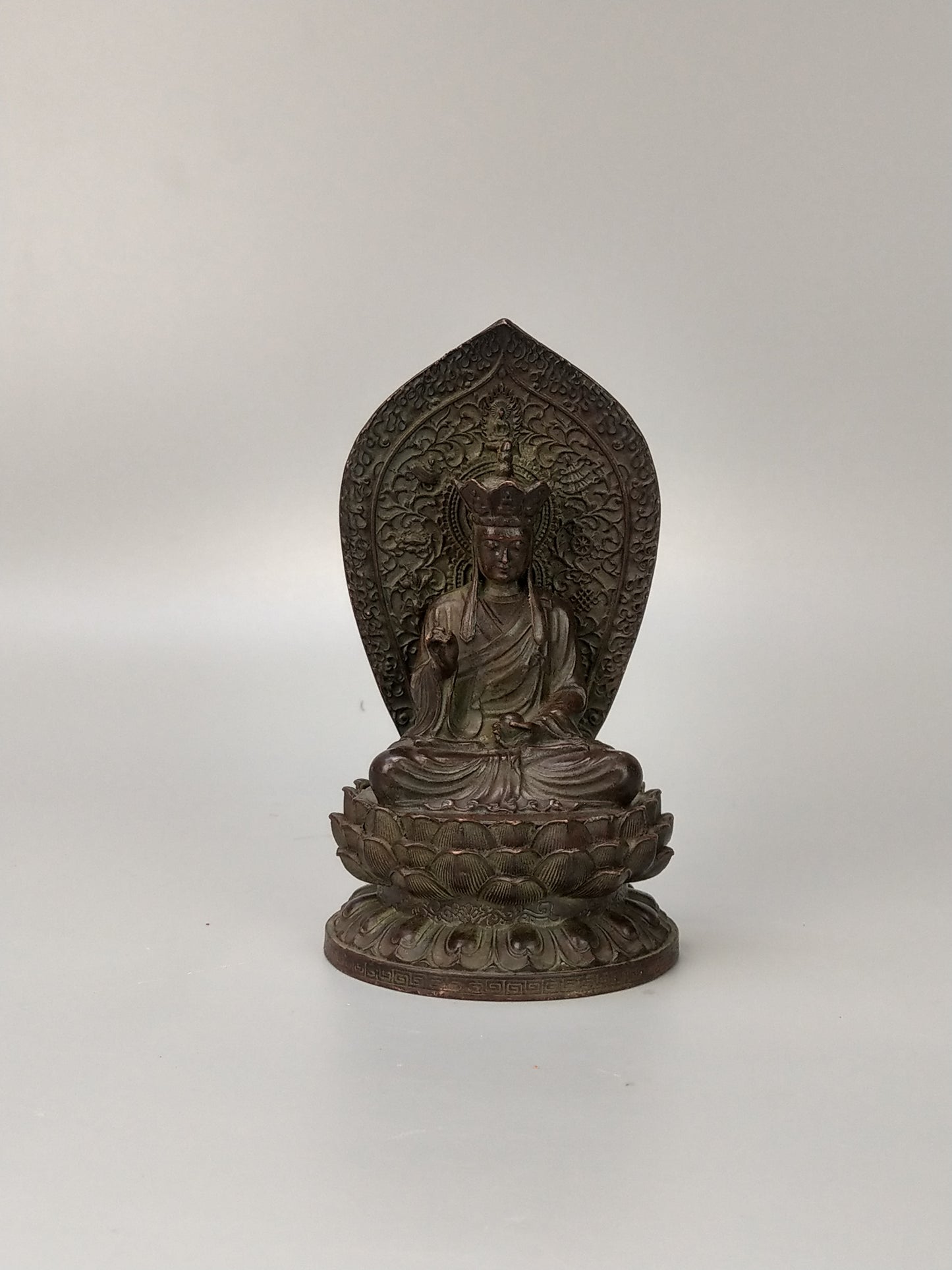 Antique Small Crowned Buddha on Lotus Leaf