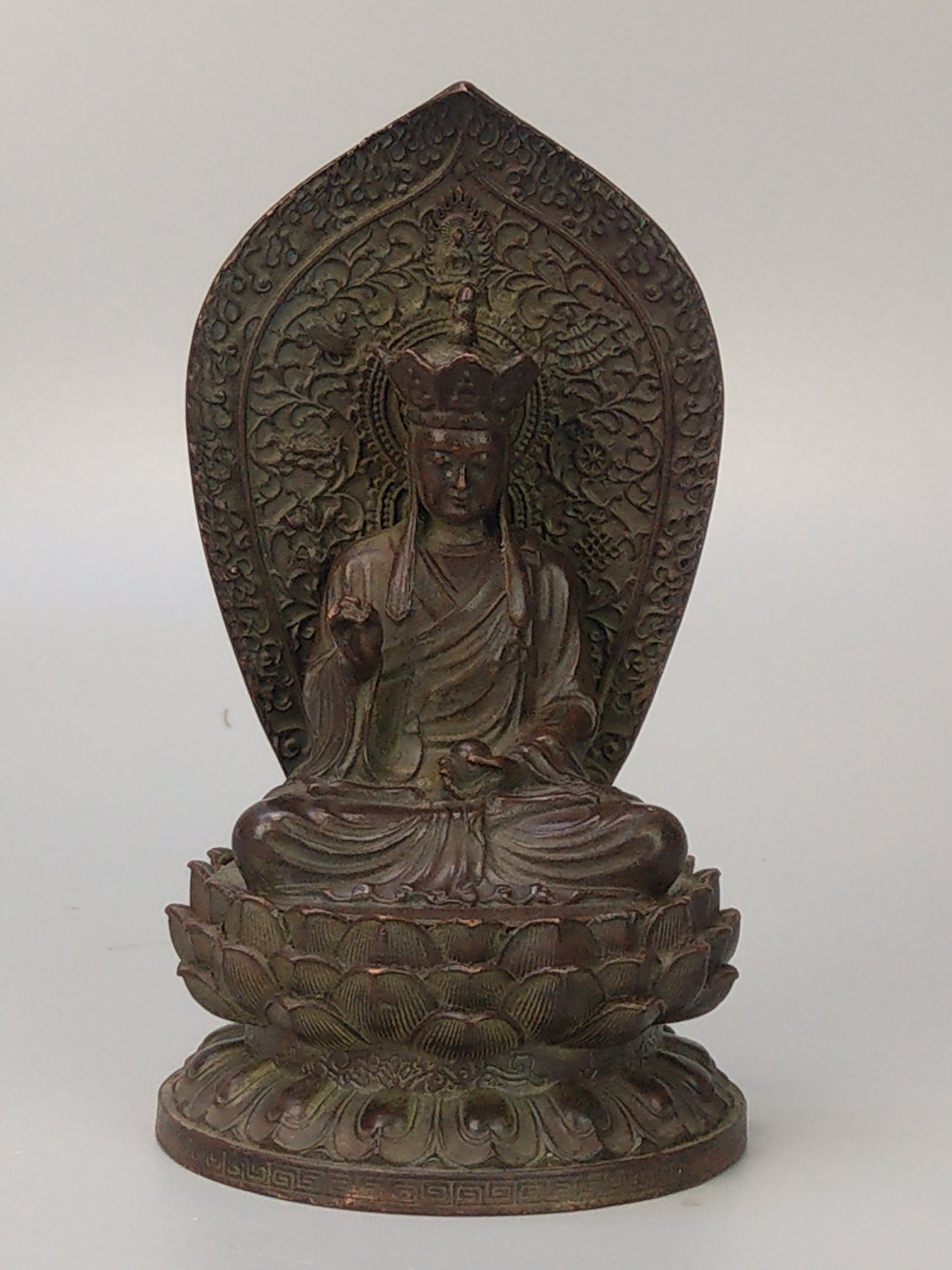 Antique Small Crowned Buddha on Lotus Leaf