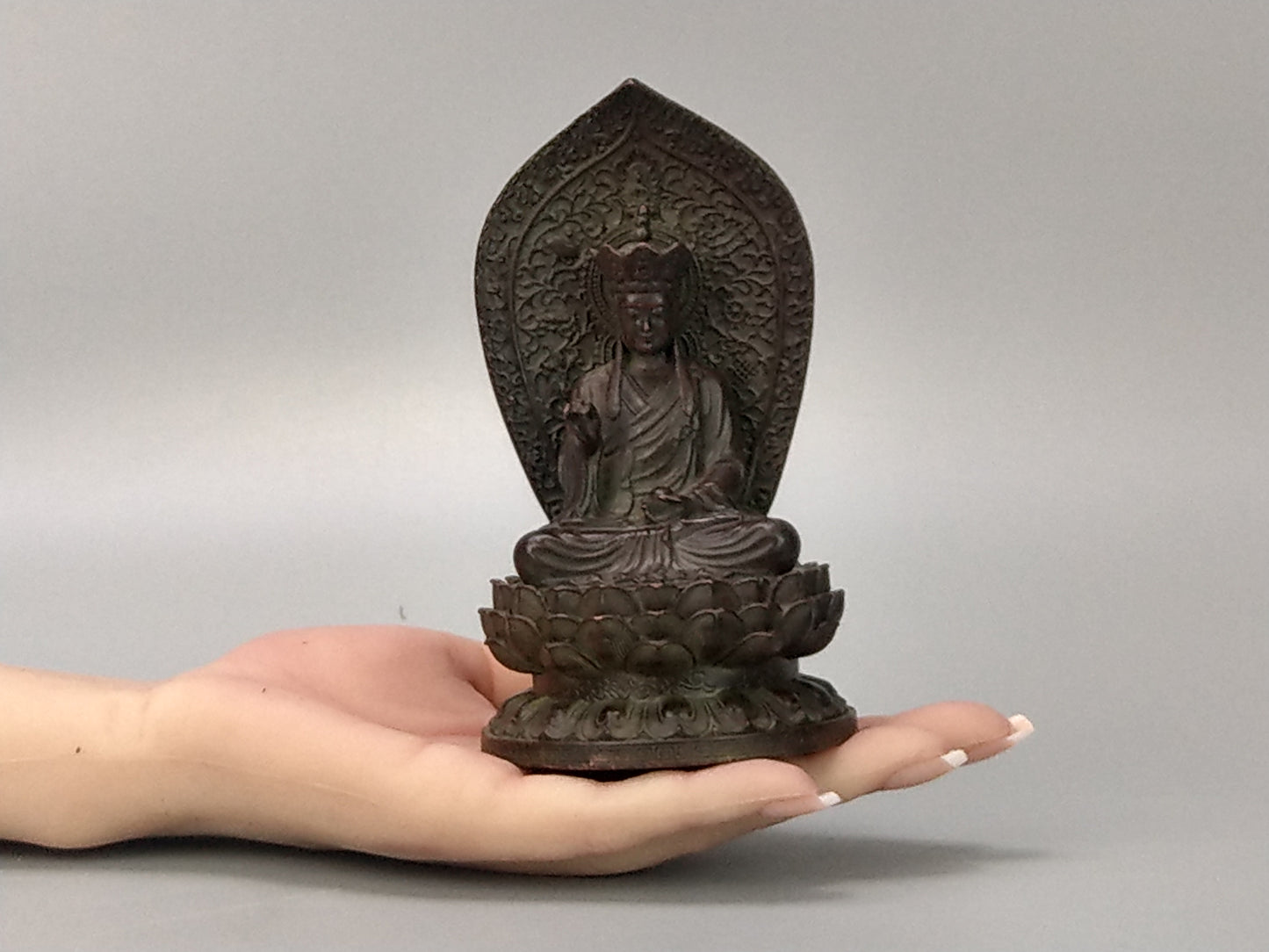 Antique Small Crowned Buddha on Lotus Leaf