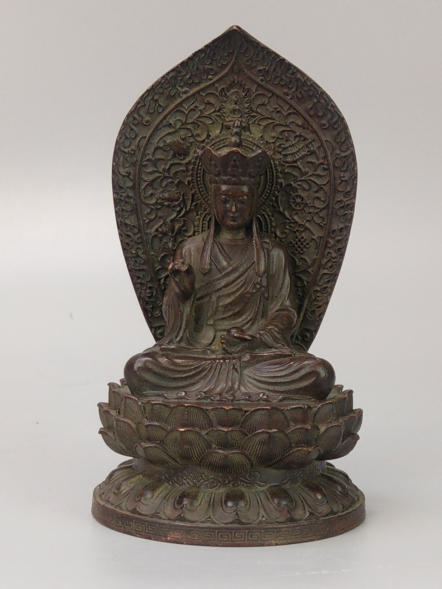 Antique Small Crowned Buddha on Lotus Leaf