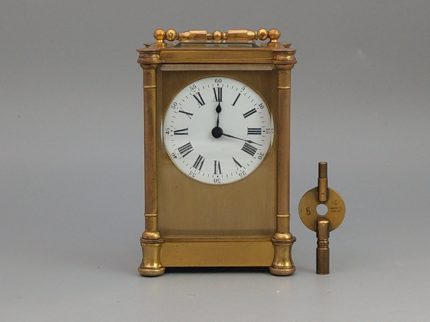 Antique Swiss Carriage Clock Gold Gilt Brass with Round Enamel Face