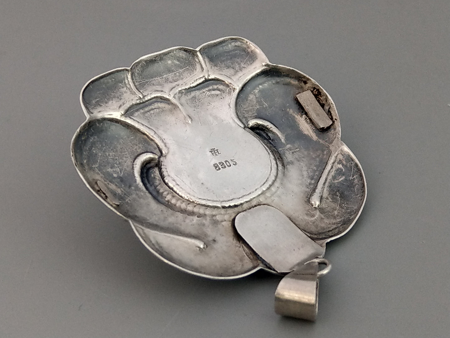 Turun Hopea Oy Pendant with Butterscotch Egg Amber