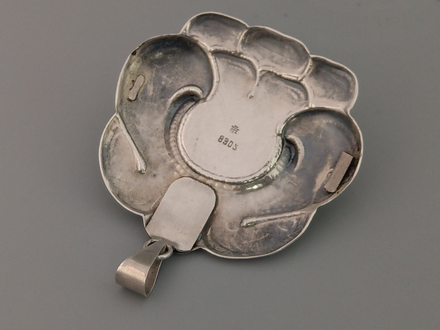 Turun Hopea Oy Pendant with Butterscotch Egg Amber