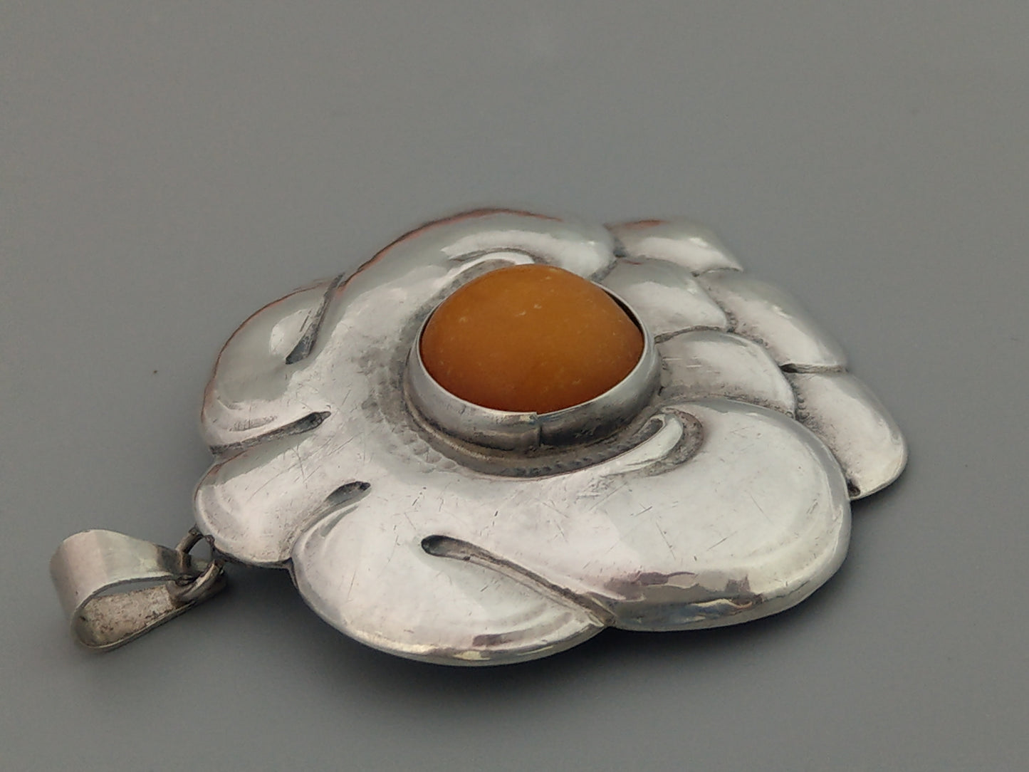 Turun Hopea Oy Pendant with Butterscotch Egg Amber