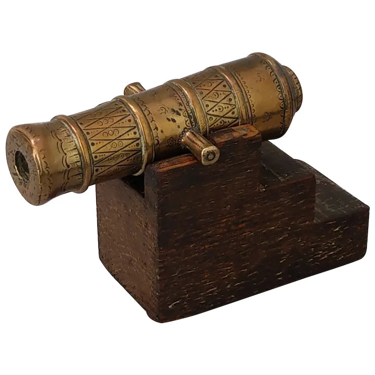 Antique Chased bronze signal cannon on wood stand