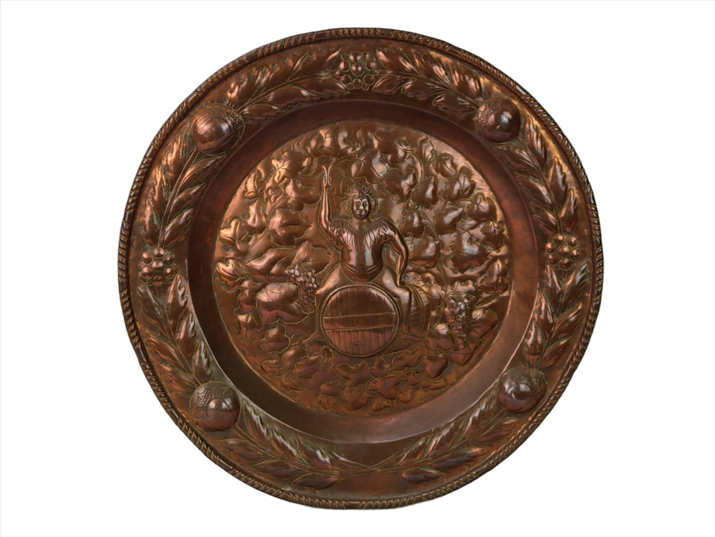 Large arts and crafts copper plaque Bacchus on the barrel with poppies wreath c.1900