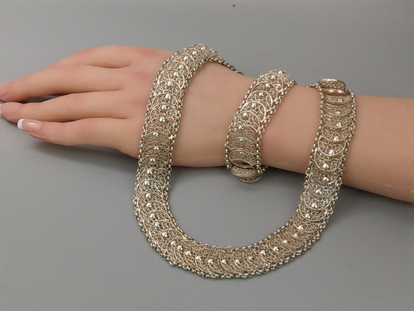 A parure Coin-Simulated Silver Filigree Bracelet and Necklace, Dutch c1960