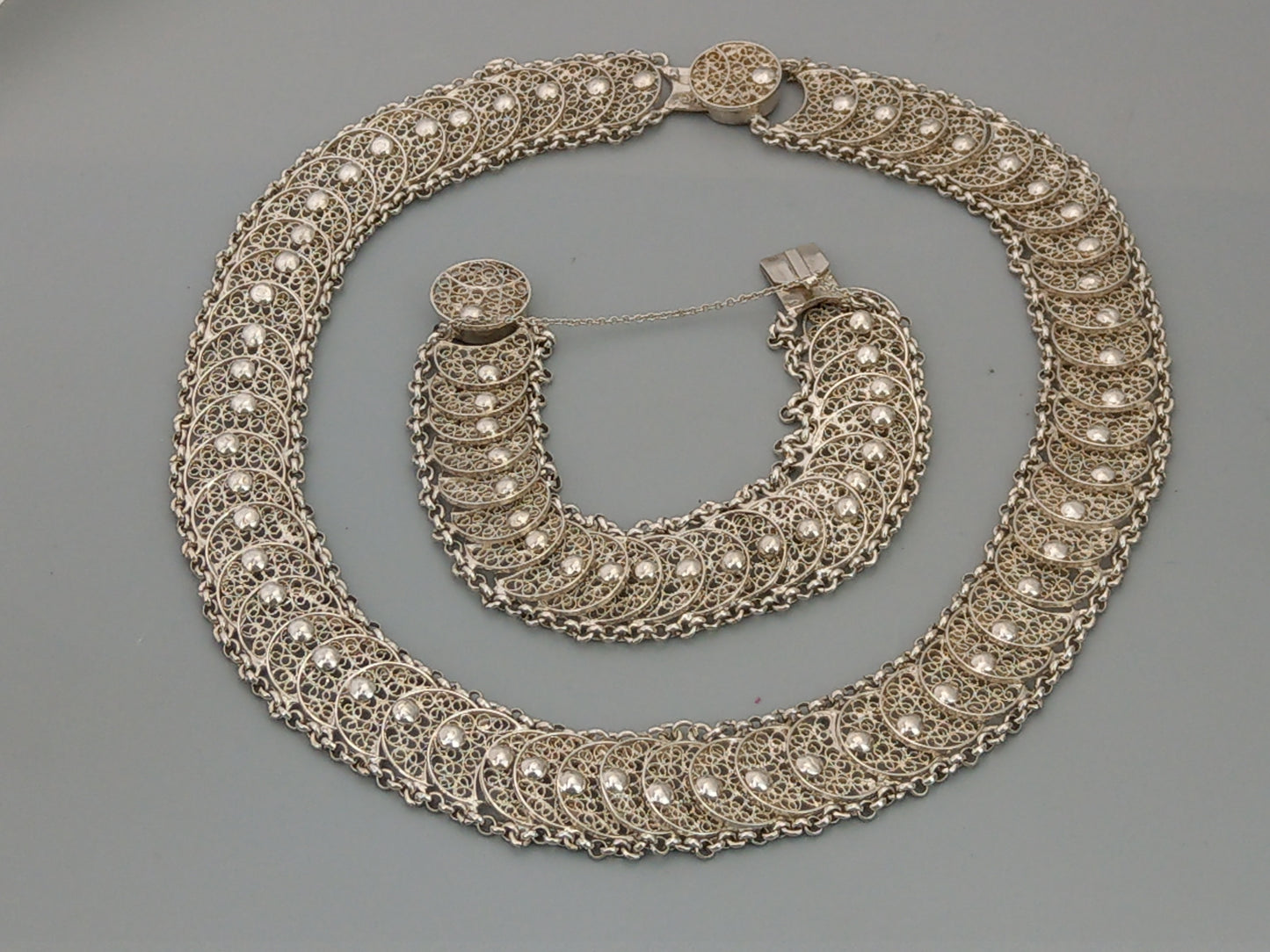 A parure Coin-Simulated Silver Filigree Bracelet and Necklace, Dutch c1960