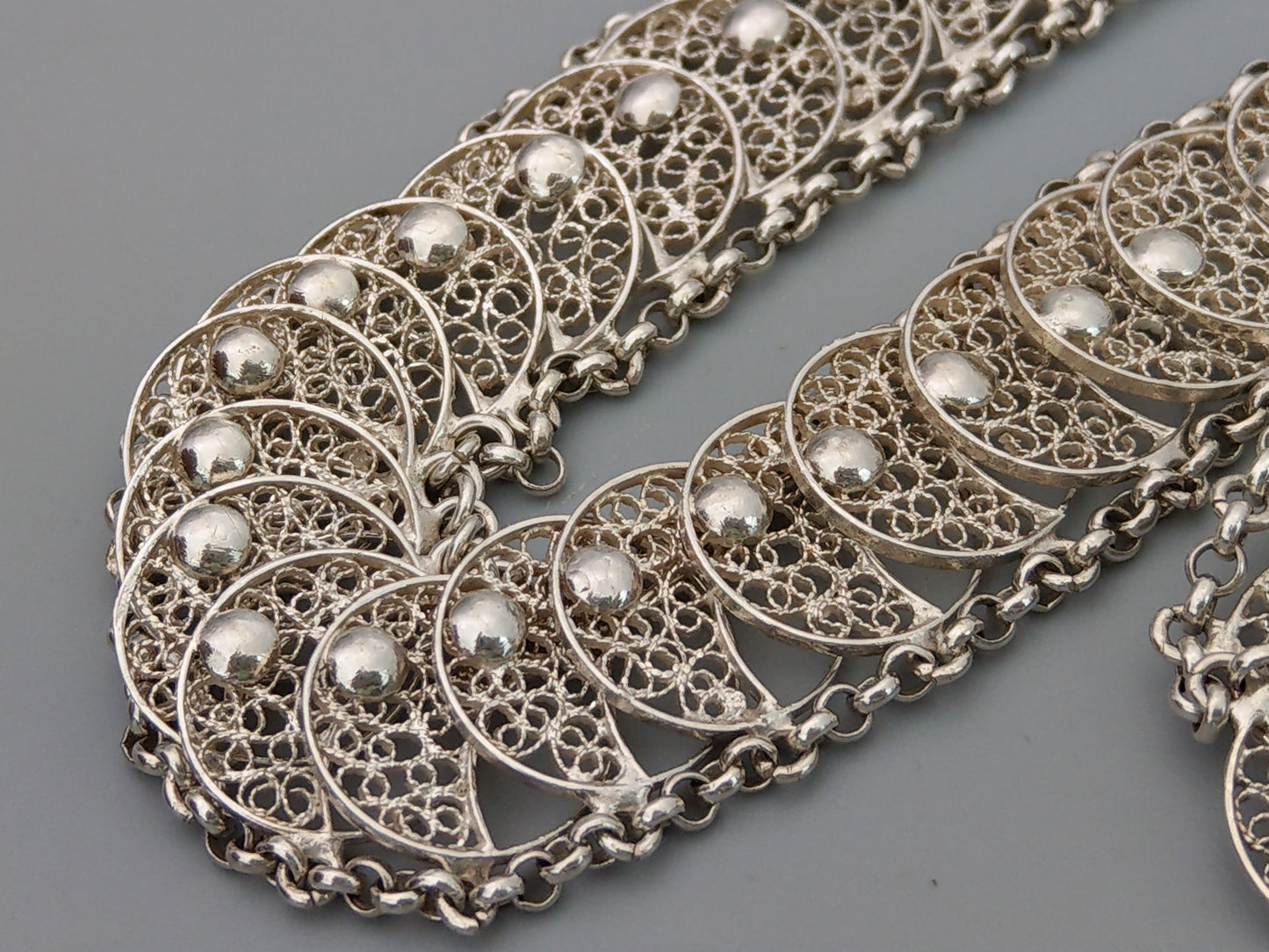 A parure Coin-Simulated Silver Filigree Bracelet and Necklace, Dutch c1960