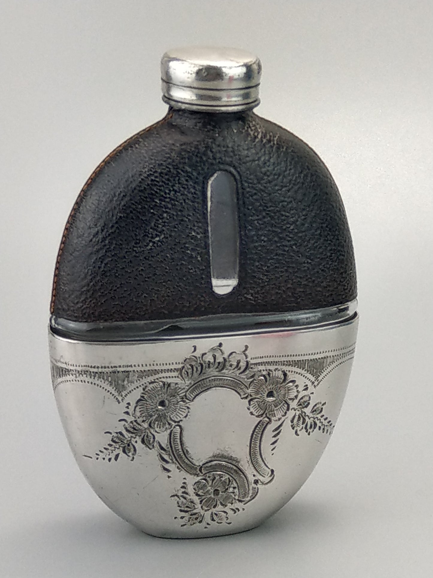 Antique Small Oval Glass Hip Flask with cup leather covered c1920