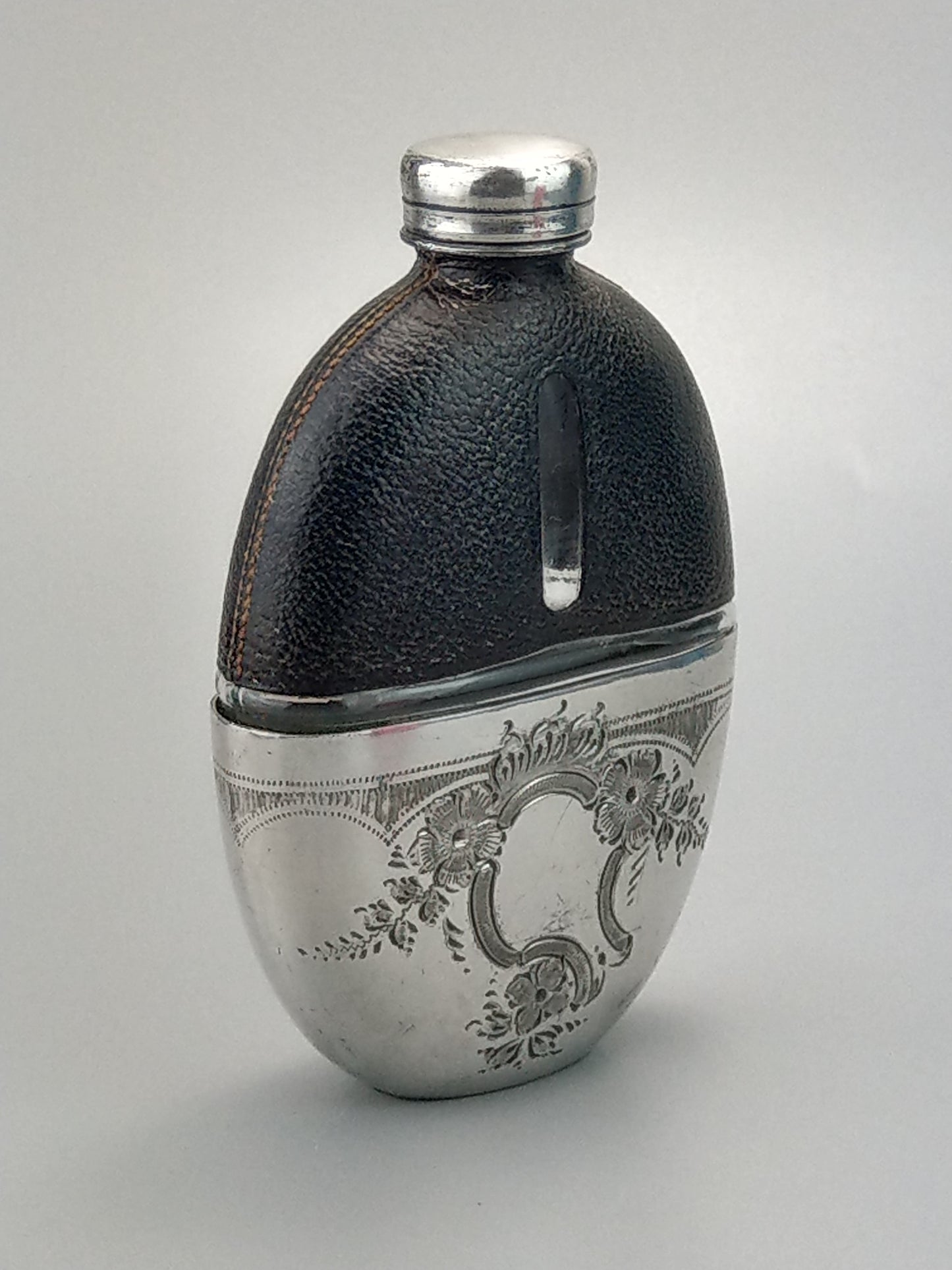 Antique Small Oval Glass Hip Flask with cup leather covered c1920