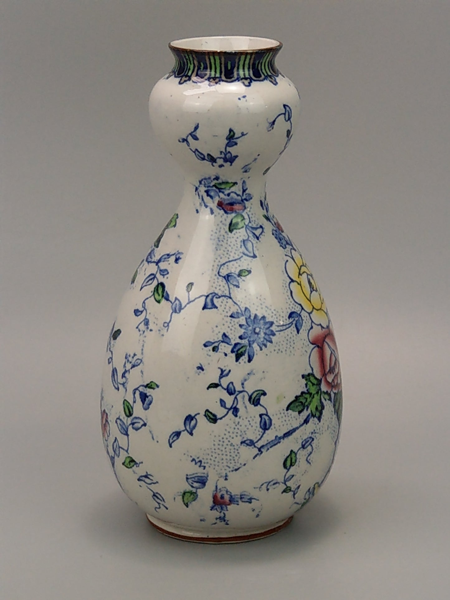 Double guard vase with blue Peony pattern by Dean Burslem England c1905