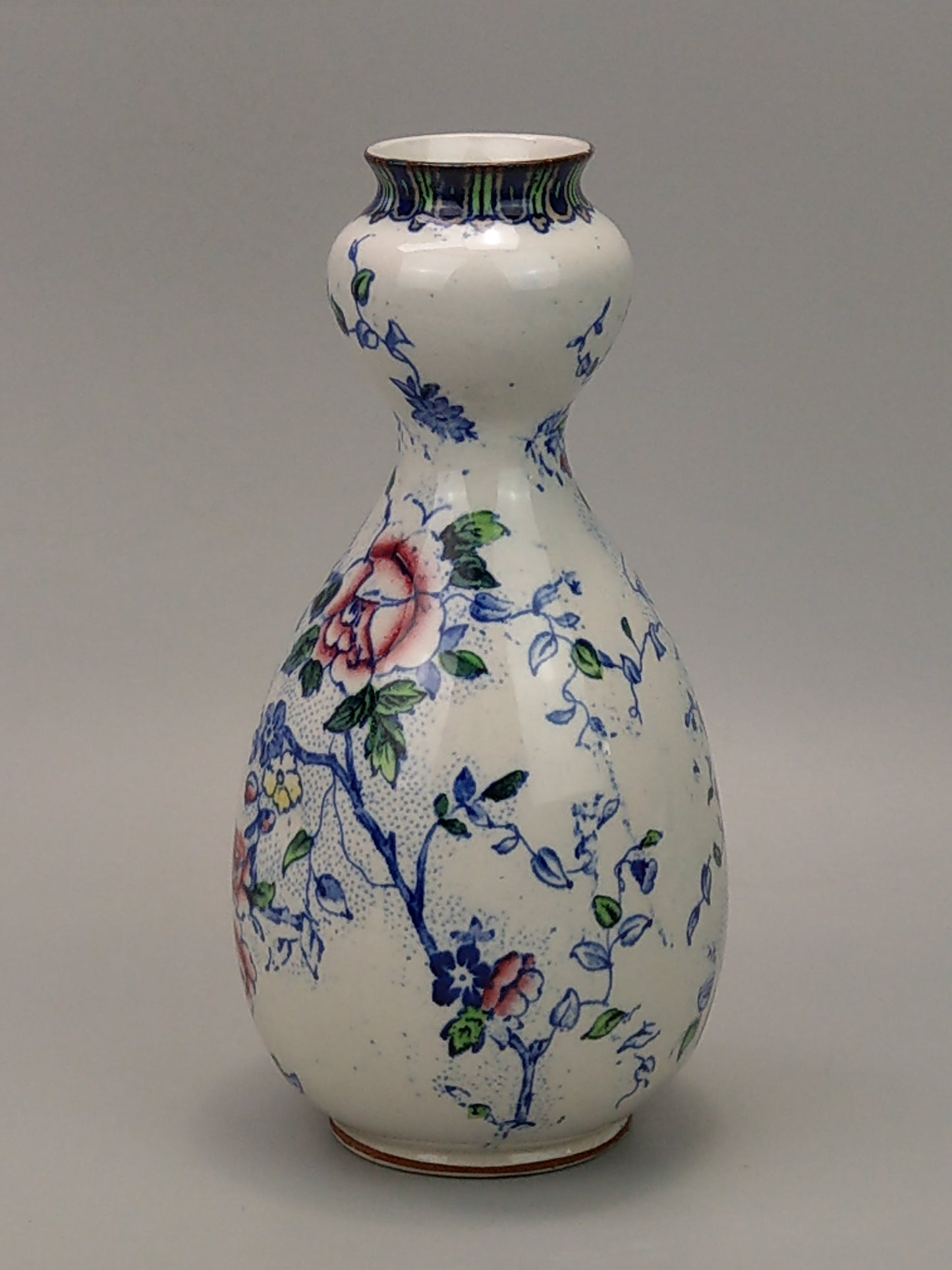 Double guard vase with blue Peony pattern by Dean Burslem England c1905