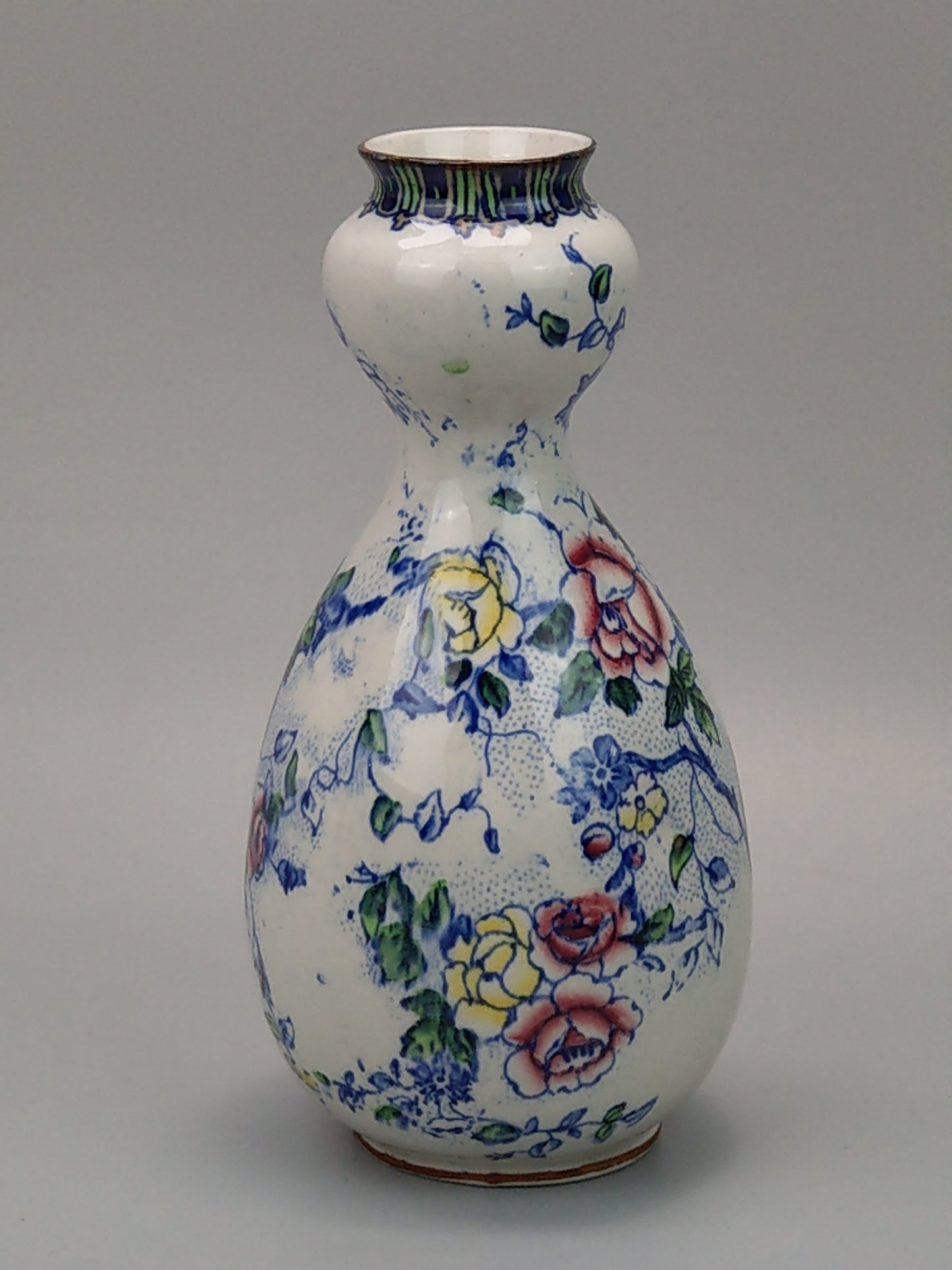 Double guard vase with blue Peony pattern by Dean Burslem England c1905