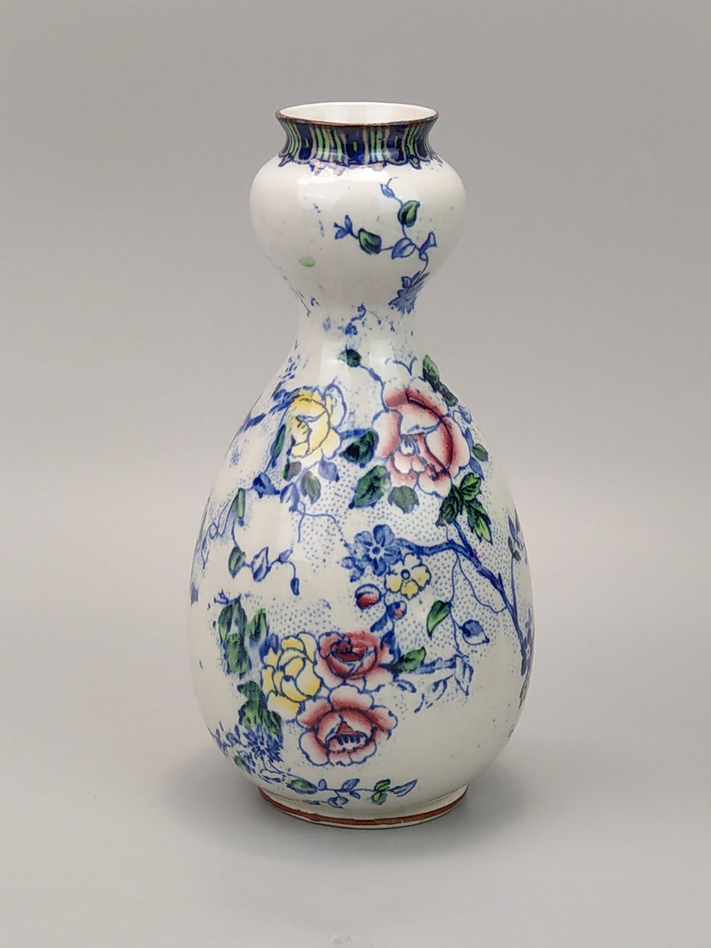 Double guard vase with blue Peony pattern by Dean Burslem England c1905