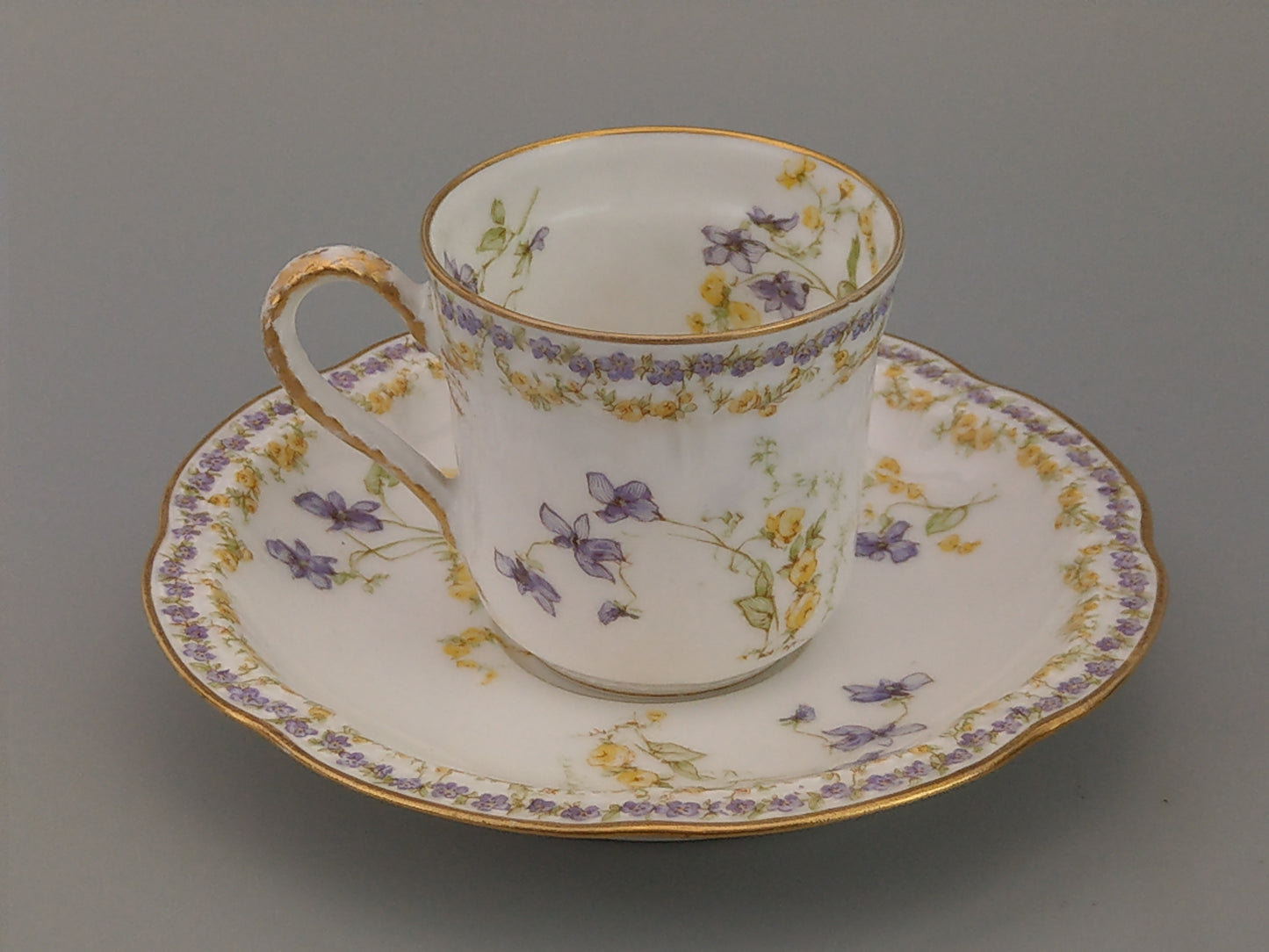 Limoges Coffee Can and Saucer Lavender and Yellow Floral Havilland and Co