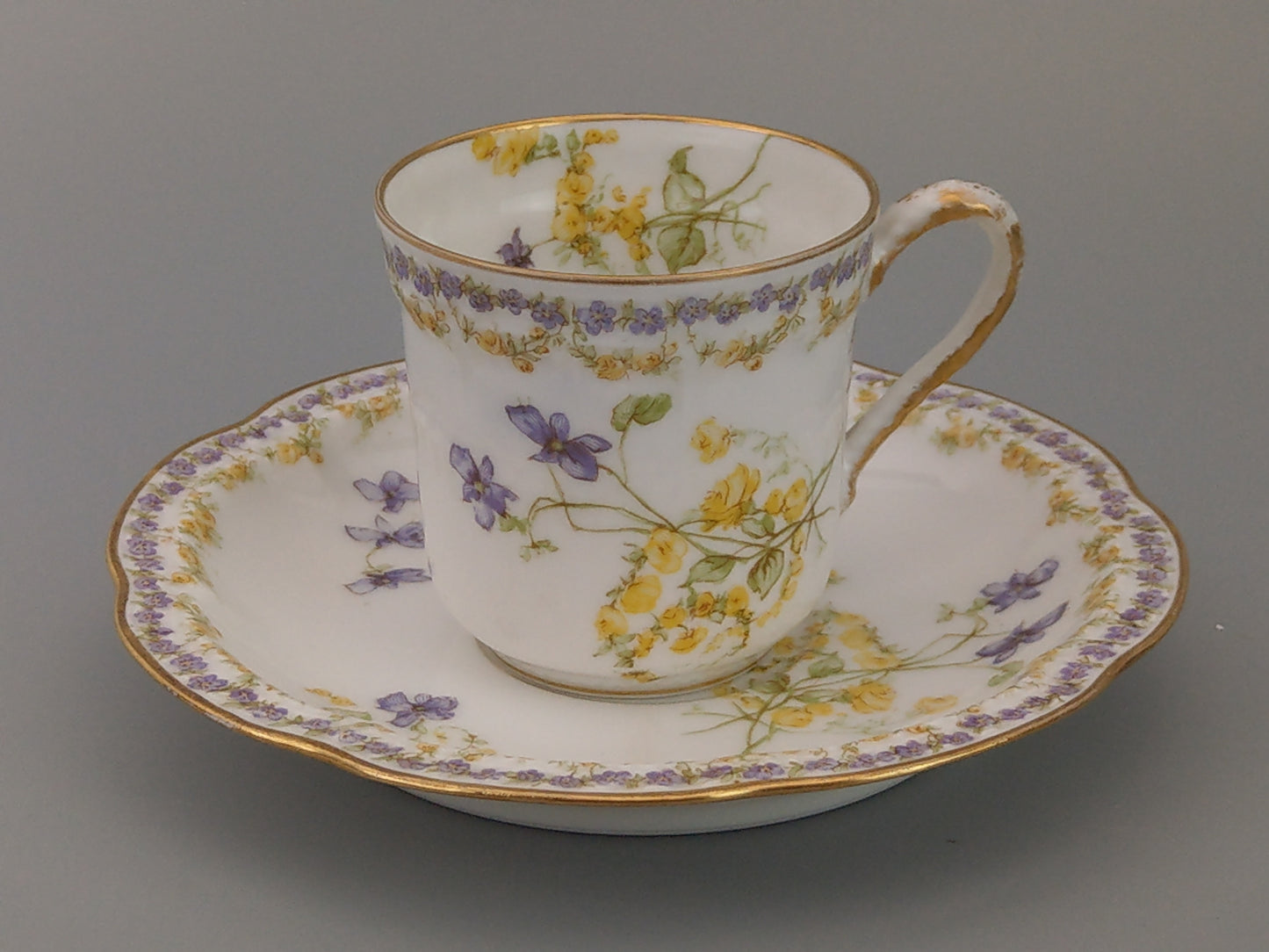 Limoges Coffee Can and Saucer Lavender and Yellow Floral Havilland and Co