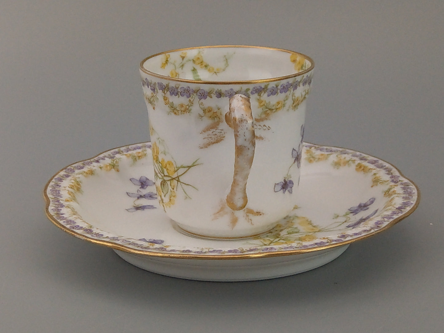 Limoges Coffee Can and Saucer Lavender and Yellow Floral Havilland and Co