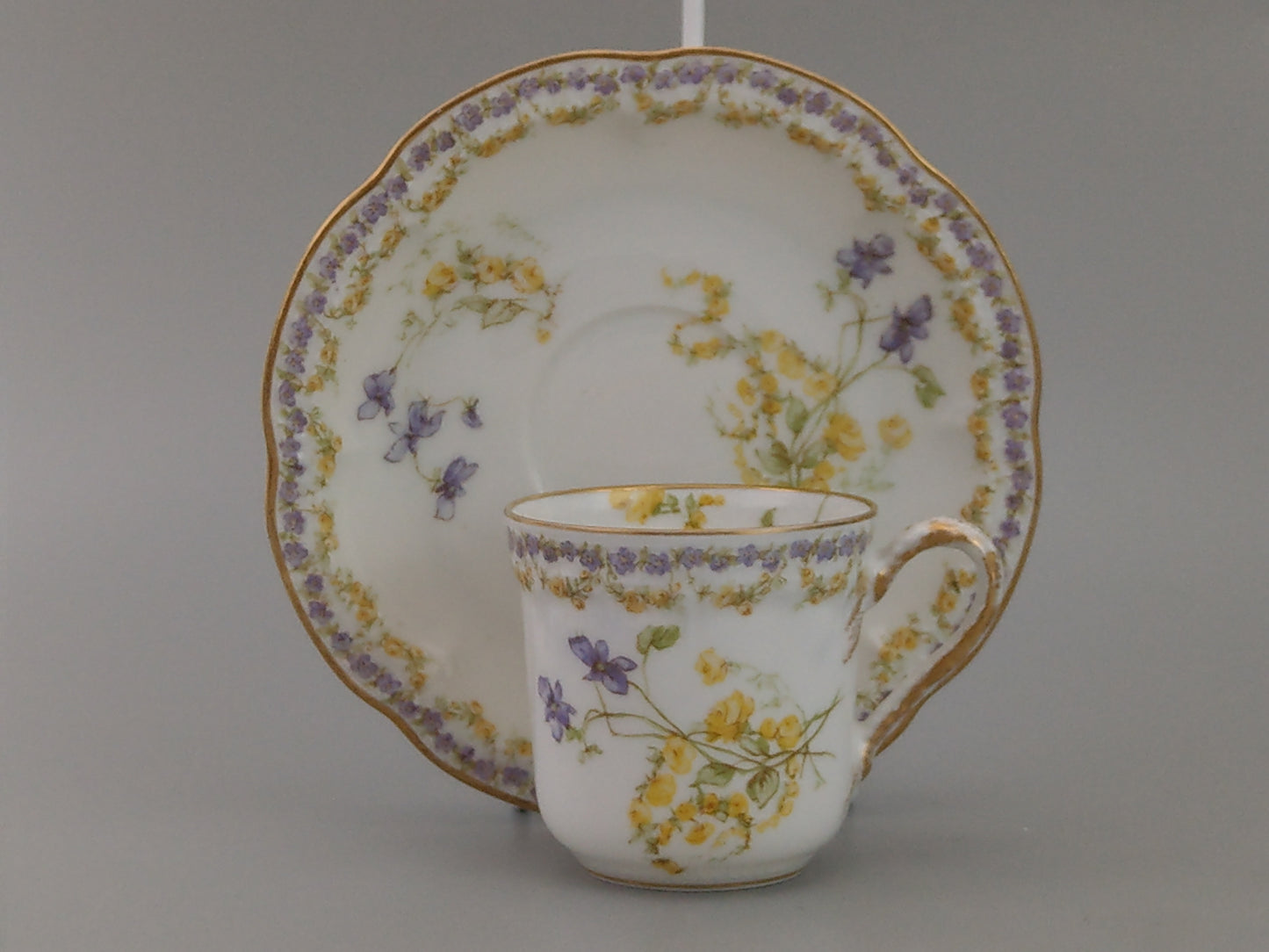 Limoges Coffee Can and Saucer Lavender and Yellow Floral Havilland and Co