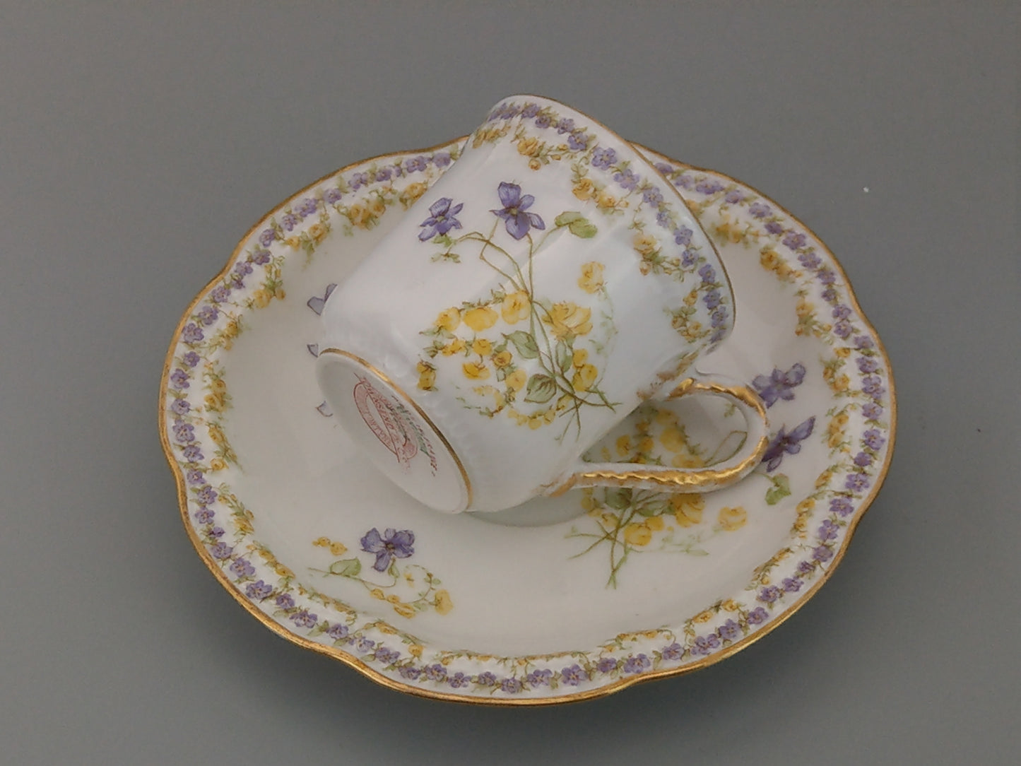 Limoges Coffee Can and Saucer Lavender and Yellow Floral Havilland and Co