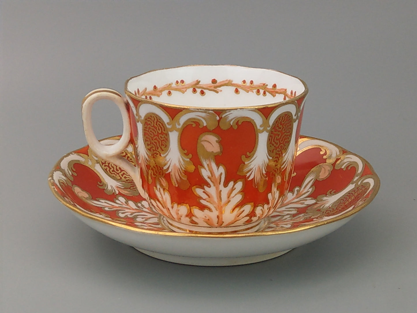 Rococo-style Cup and Saucer, Orange and Gold Davenport c1850, Pattern 2144