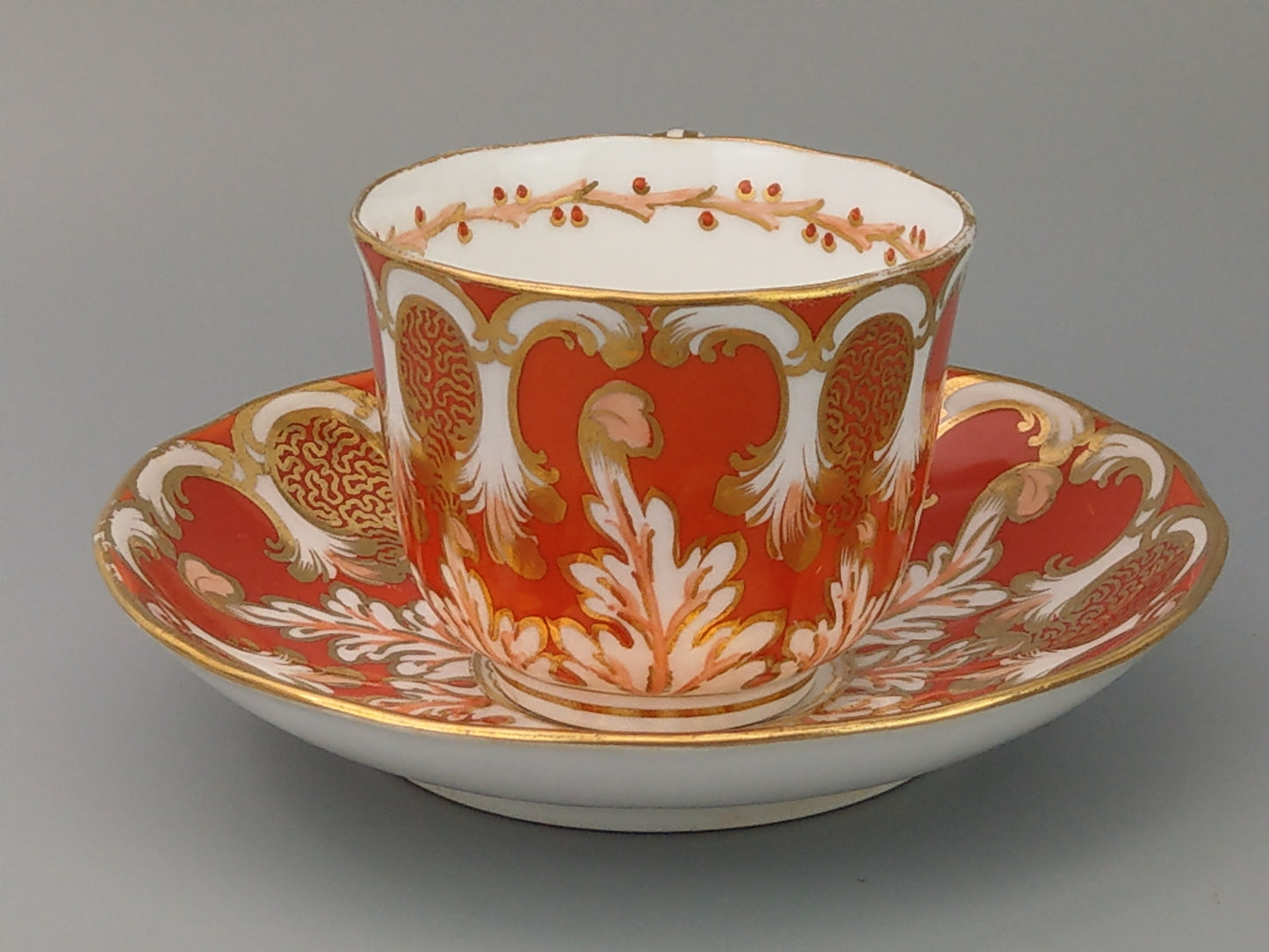 Rococo-style Cup and Saucer, Orange and Gold Davenport c1850, Pattern 2144