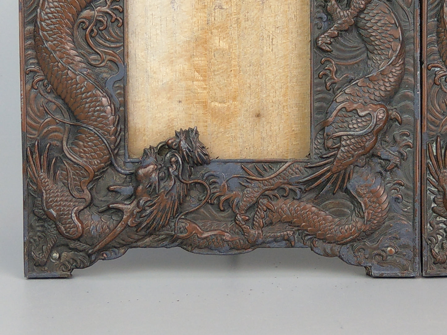 Pair of Chinese copper photo frames with dragons c 1900s