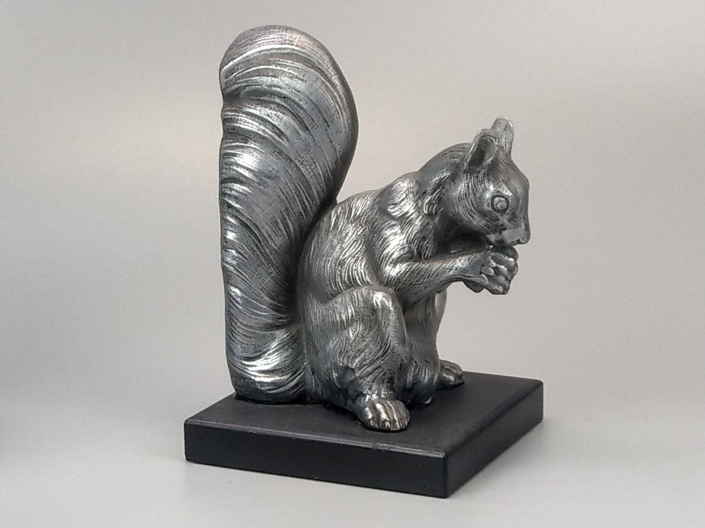 French Art Deco silver squirrel bookends slate base